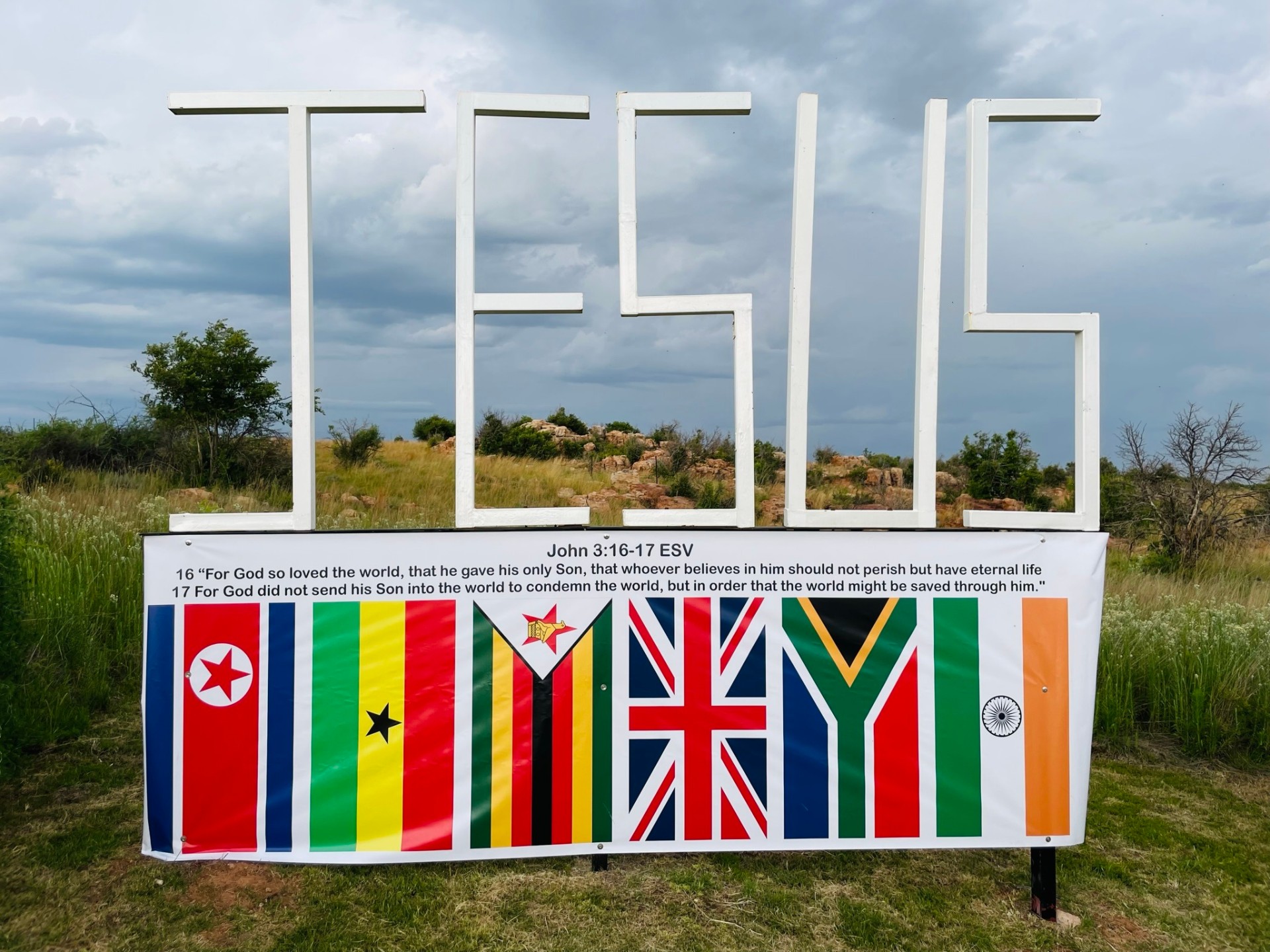 JESUS sign with the John 3:16 nations banner